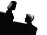 Video Clip - Human figures depicted in black in front of a white background; looking over somebody