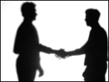 Video Clip - Human figures depicted in black in front of a white background; talking followed by hand shake