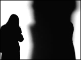 Video Clip - Human figures depicted in black in front of a white background; talking on the phone outside