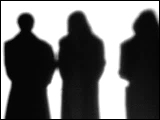 Video Clip - Human figures depicted in black in front of a white background; people chatting in a group
