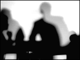 Video Clip - Human figures depicted in black in front of a white background; people agreeing during meeting