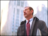 Video Clip - Man in business attire calling for a Taxi