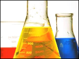 Video Clip - Red, yellow and blue liquids are shown in a beaker and two flasks