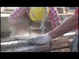 Video Clip - A resisential house being built with tools and other heavy machinery