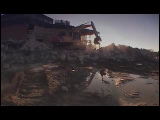 Video Clip - A building structure being demonished by a bulldozer