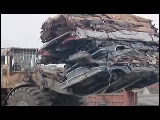 Video Clip - Scrap metal being recycled at a facility